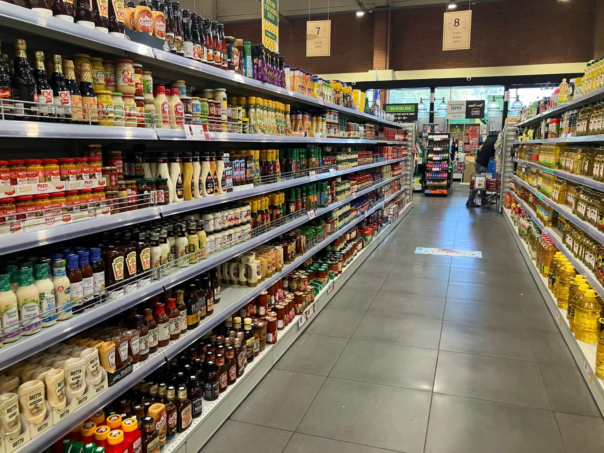 Israeli,Supermarket.,Rows,Of,Goods.,Big,Flag,Of,Israel.,Concept: