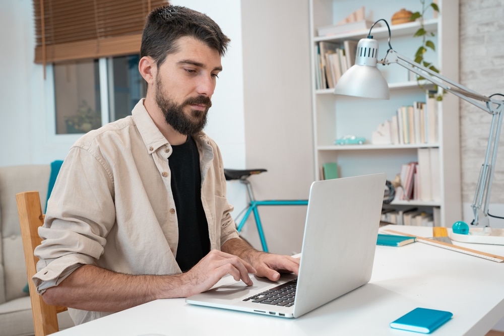 Business,Man,Working,On,Laptop,At,Home,Office.,Young,Student